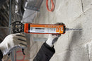 Person using a C-Mix Plus on a concrete surface